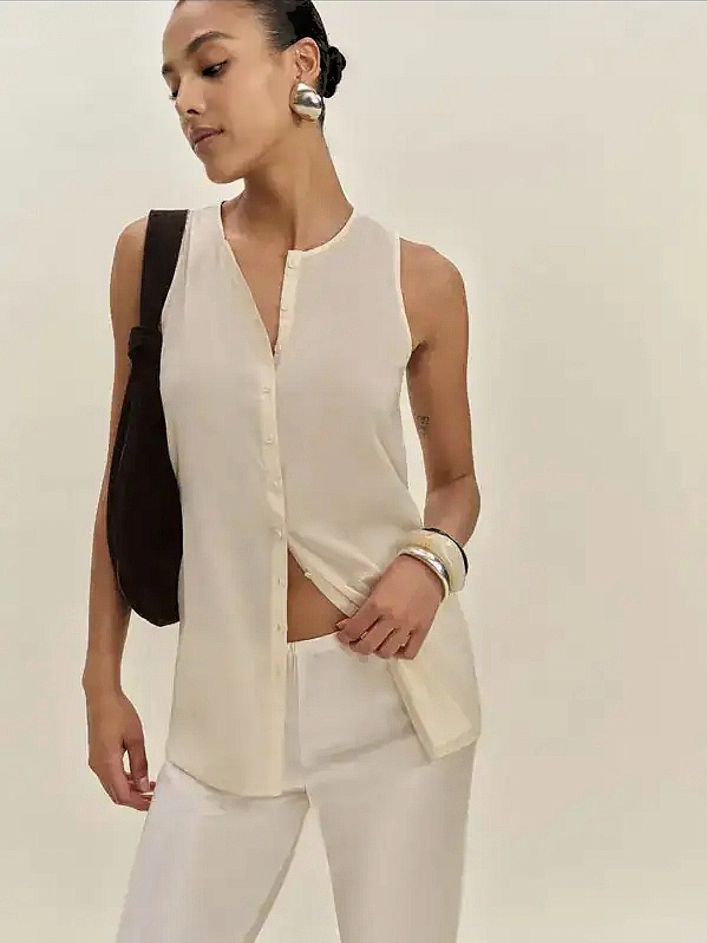 Reformation Sleeveless Button-Down Shell in Cream